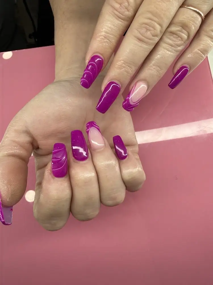 Vibrant purple manicured nails